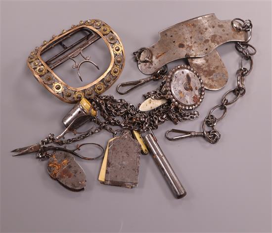 An early 19th century steel and marcasite chatelaine with tools, a similar large buckle and a steel hanger